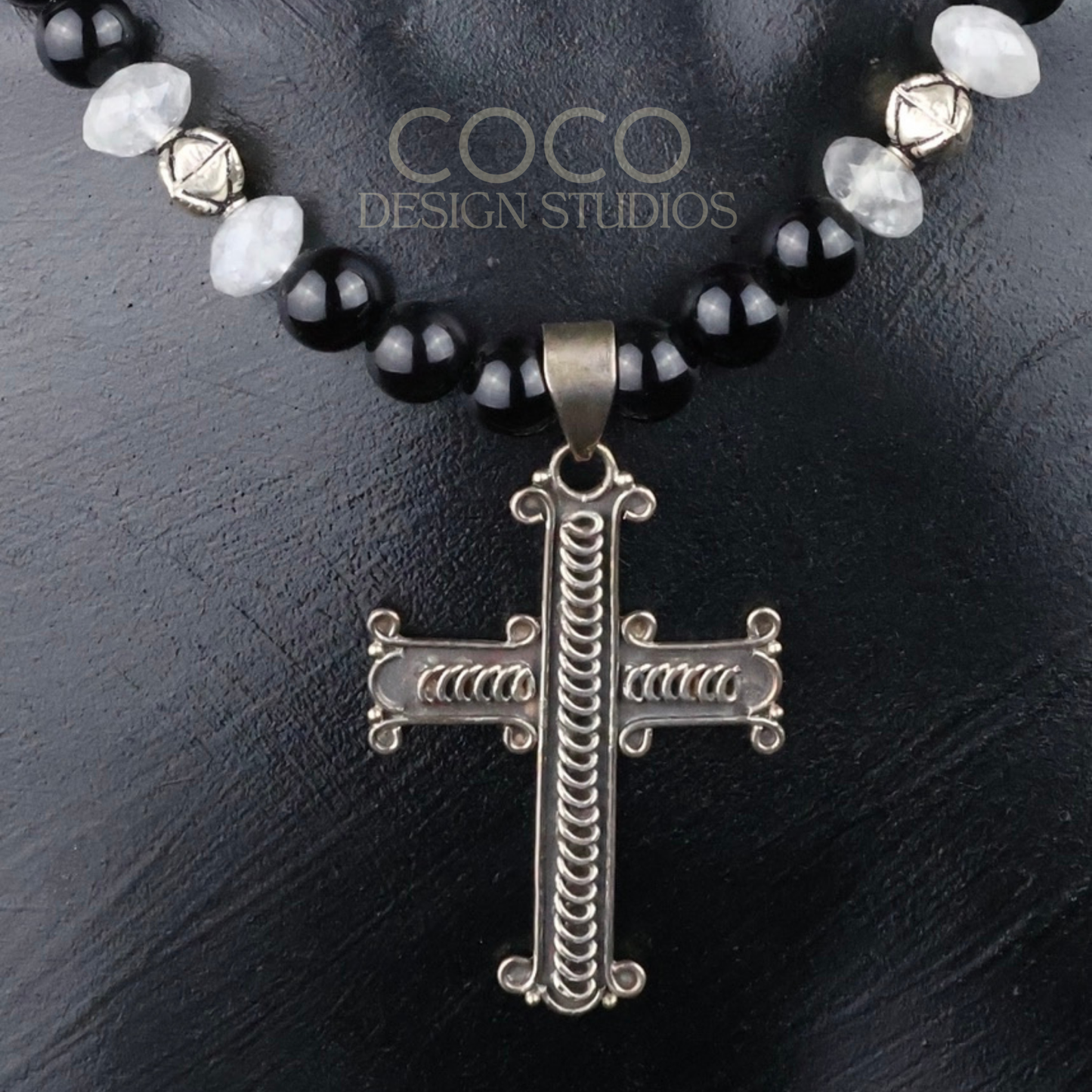Sterling Silver Cross on Black Onyx